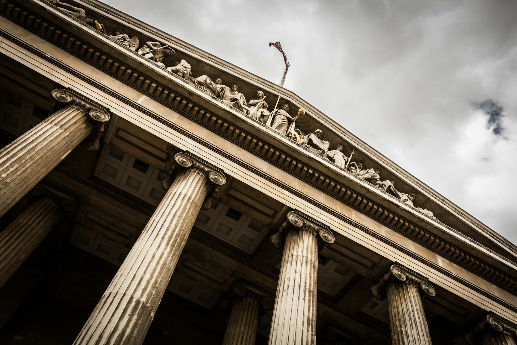 A classical courthouse seen from below